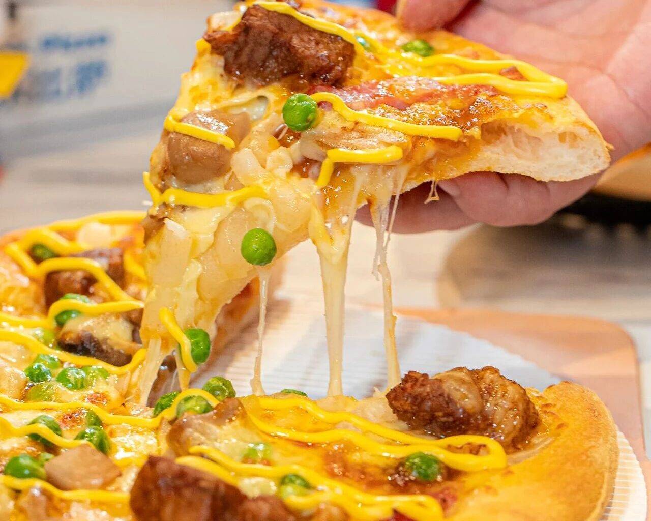 真香预警！达美乐指定比萨限时“买1送1”